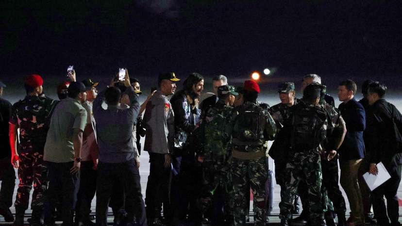 New Zealand pilot Phillip Mehrtens, who has been freed more than year and a half after being held hostage by a pro-independence group, arrives at Military Airbase Operation Halim Perdanakusuma in Jakarta