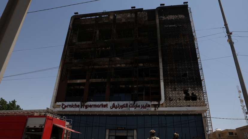 Overnight fire at a shopping center kills dozens of people, in al-Kut