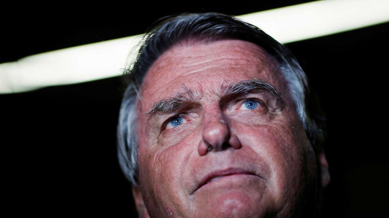 Brazil's former President Jair Bolsonaro arrives at Brasilia International Airport