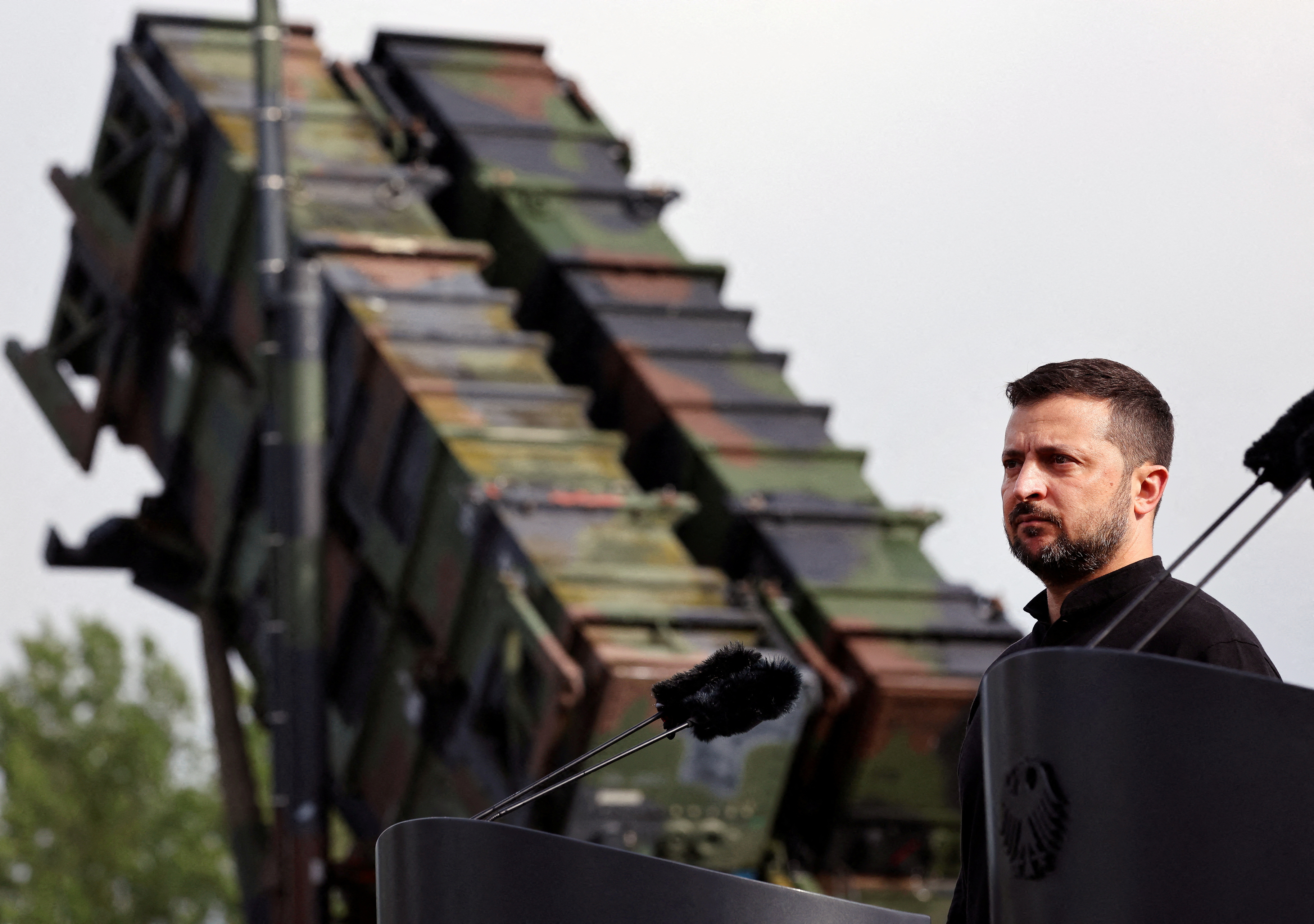 FILE PHOTO: Ukrainian President Volodymyr Zelenskiy visit to a military training area