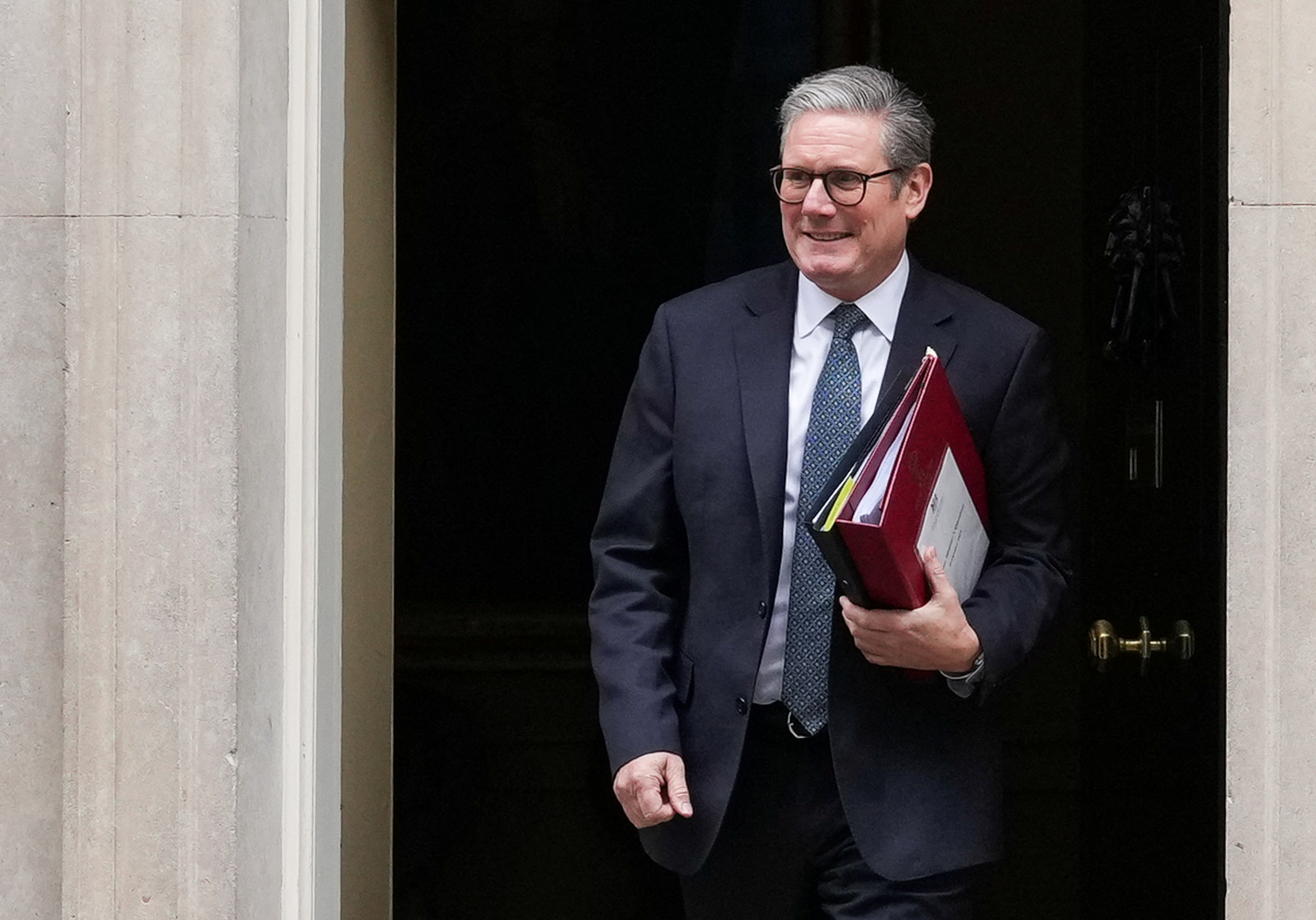British Prime Minister Keir Starmer leaves 10 Downing Street on budget day in London