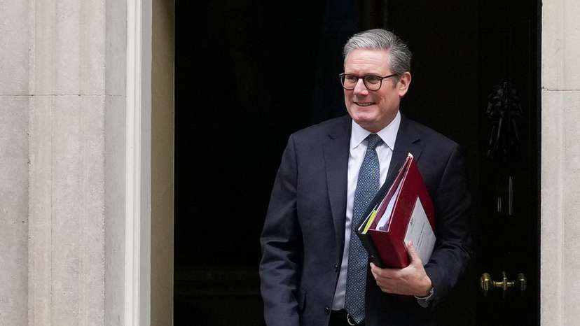 British Prime Minister Keir Starmer leaves 10 Downing Street on budget day in London