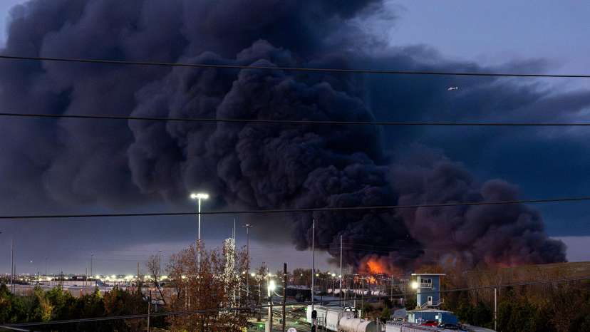 Smoke rises from the wreackage of a UPS MD-11 cargo jet after it crashed on departure from Louisville airport