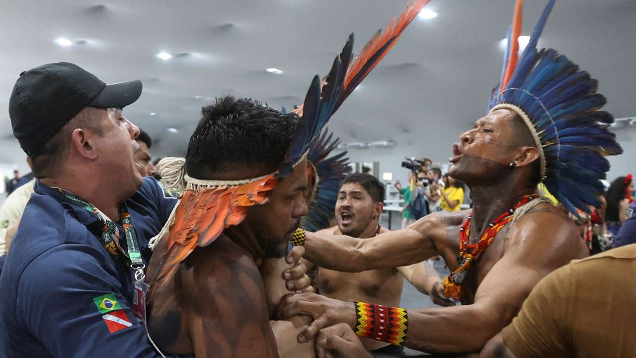 Demonstrators force their way into the venue hosting the UN Climate Change Conference (COP30), in Belem