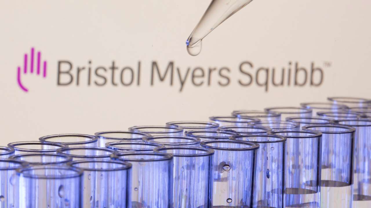 FILE PHOTO: Test tubes are seen in front of a displayed Bristol Myers Squibb logo in this illustration