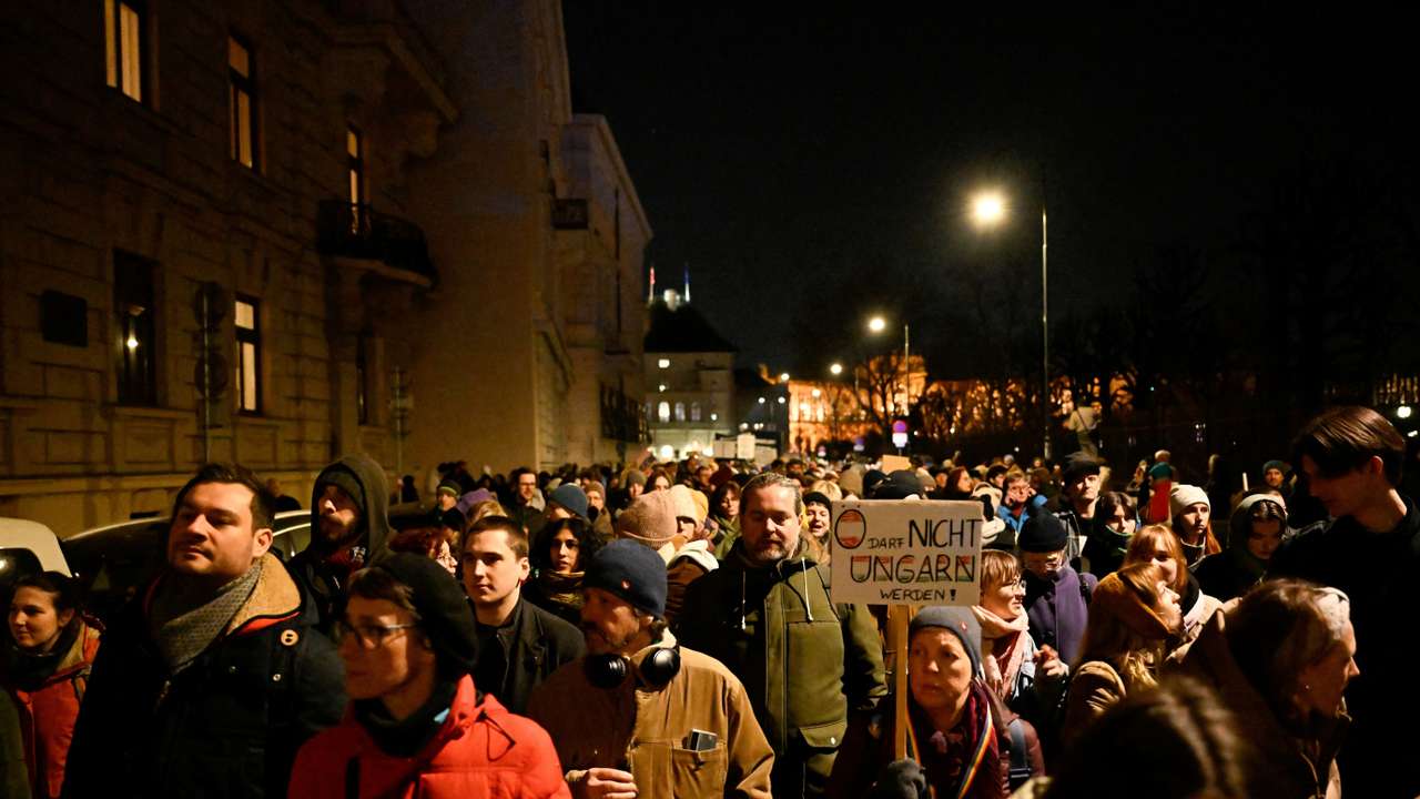 People take part in a protest against the participation of far-right party FPO in the process of forming a coalition government in Vienna