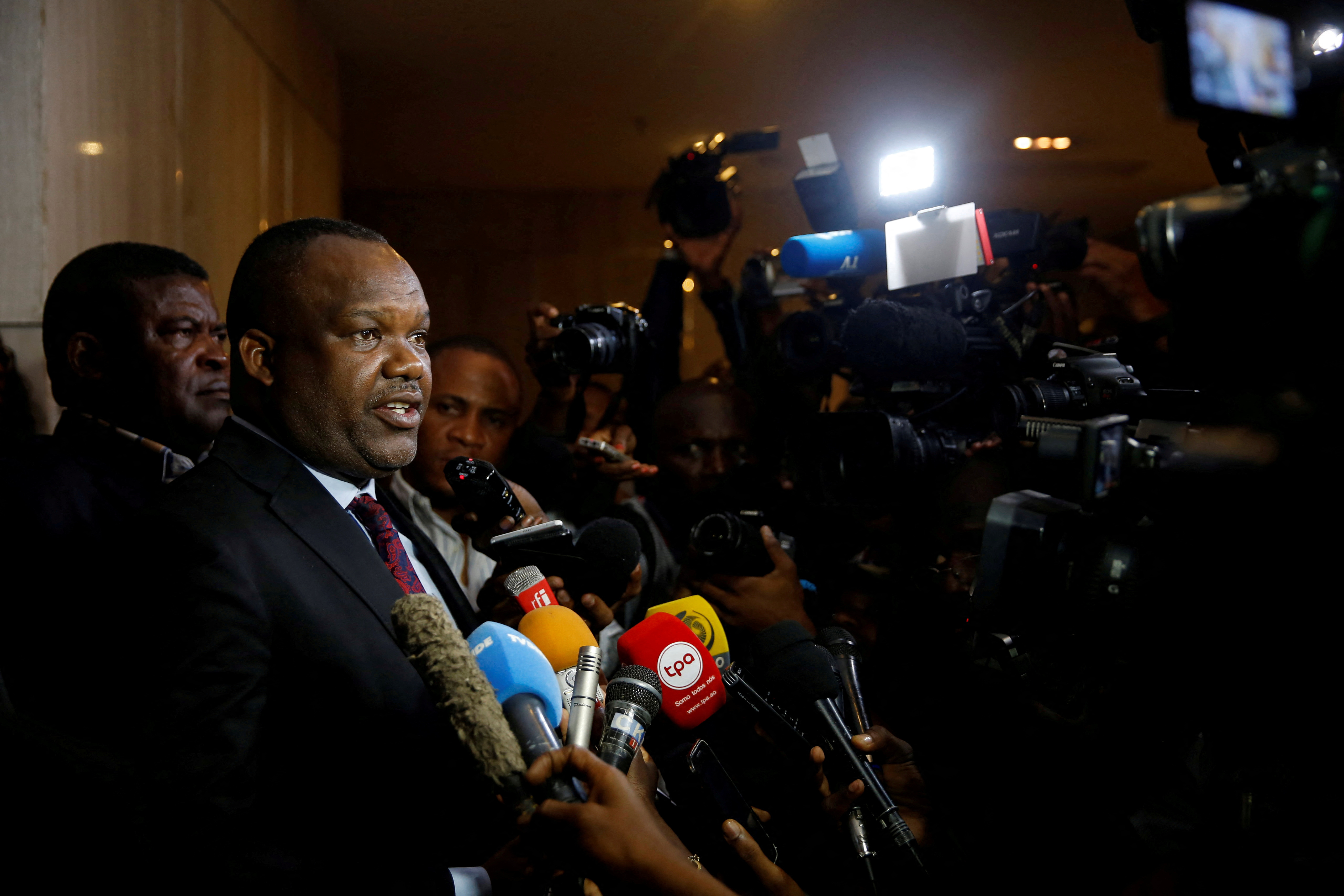 FILE PHOTO: Corneille Nangaa President of Congo's National Independent Electoral Commission, talks with journalists after his meeting with presidential candidates and observers from the Southern African Development Community in Kinshasa