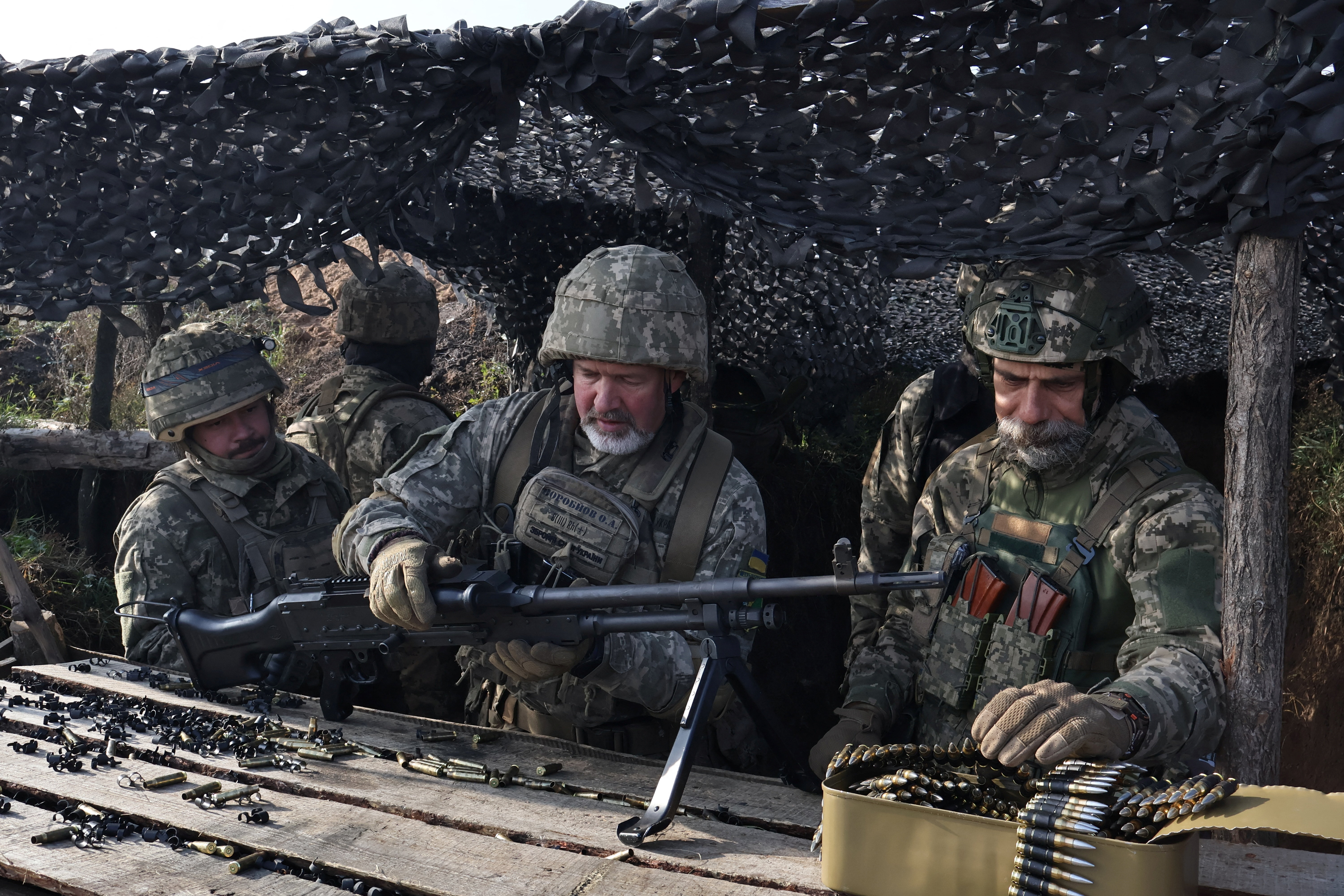 Ukrainian service members attend a military training near a frontline in Zaporizhzhia region