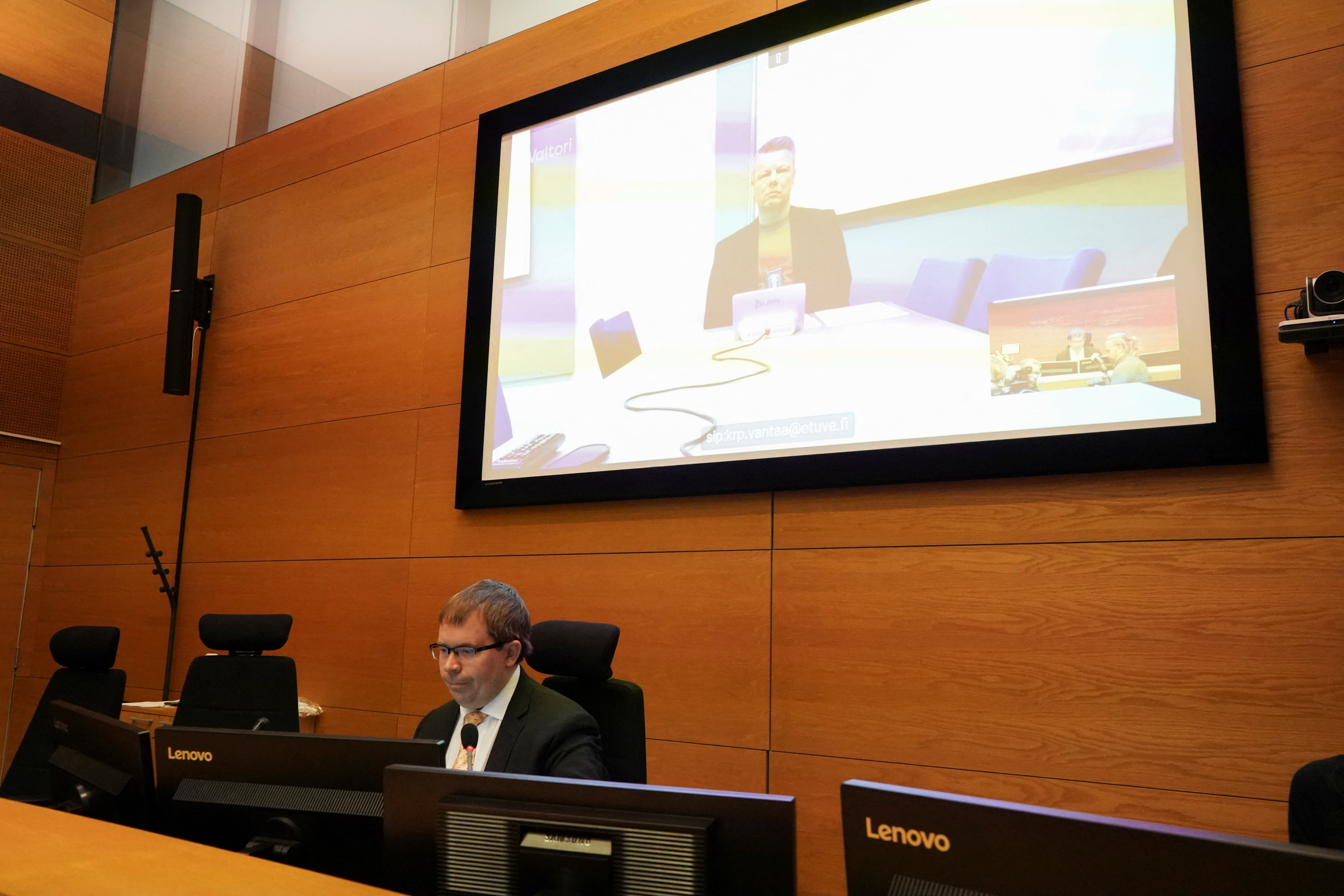 Helsinki district court judge Tatu Koistinen attends a court hearing in Helsinki