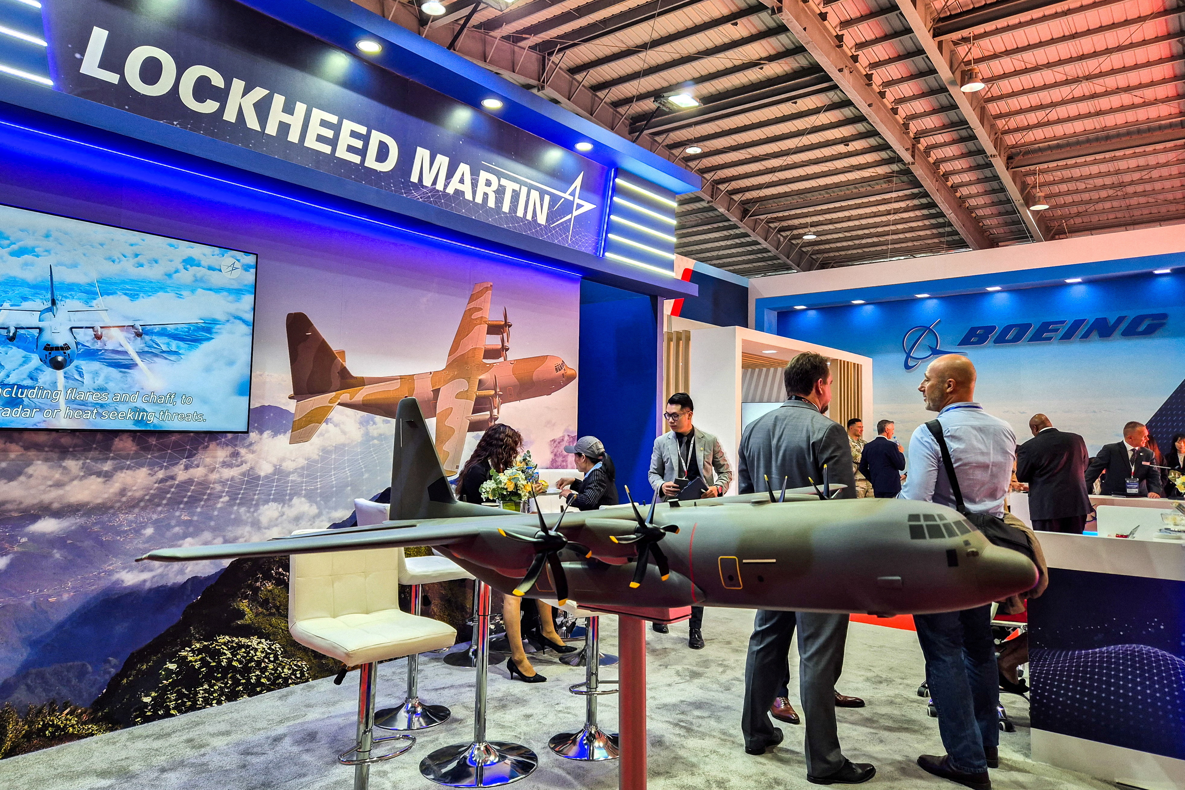 FILE PHOTO: FILE PHOTO: A Vietnam arms fair displays a model of a military transport plane at a Lockheed Martin booth