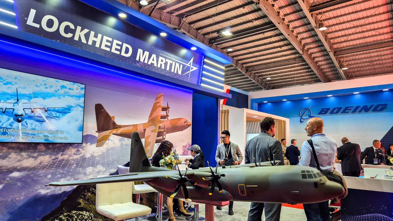 FILE PHOTO: FILE PHOTO: A Vietnam arms fair displays a model of a military transport plane at a Lockheed Martin booth