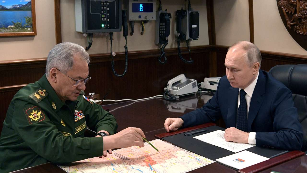 FILE PHOTO: Russia's President Putin and Defence Minister Shoigu meet in St Petersburg