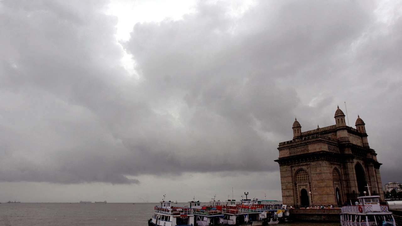 FILE PHOTO: Monsoon clouds gather over the Gateway of India in Mumbai
