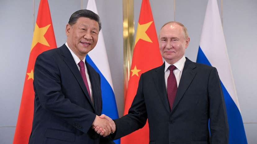 Russian President Putin and Chinese President Xi meet in Astana