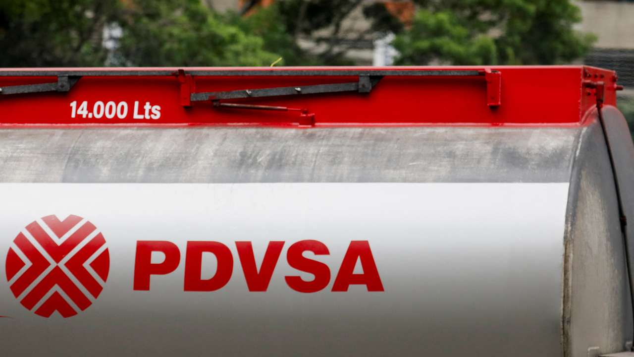 The logo of PDVSA is seen around Caracas