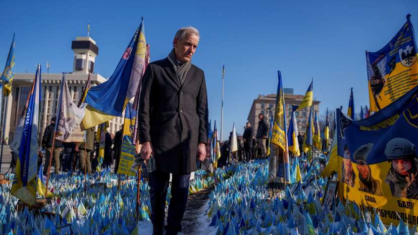 Norway's Prime Minister Jonas Gahr Stoere walks at Maidan Square in Kyiv