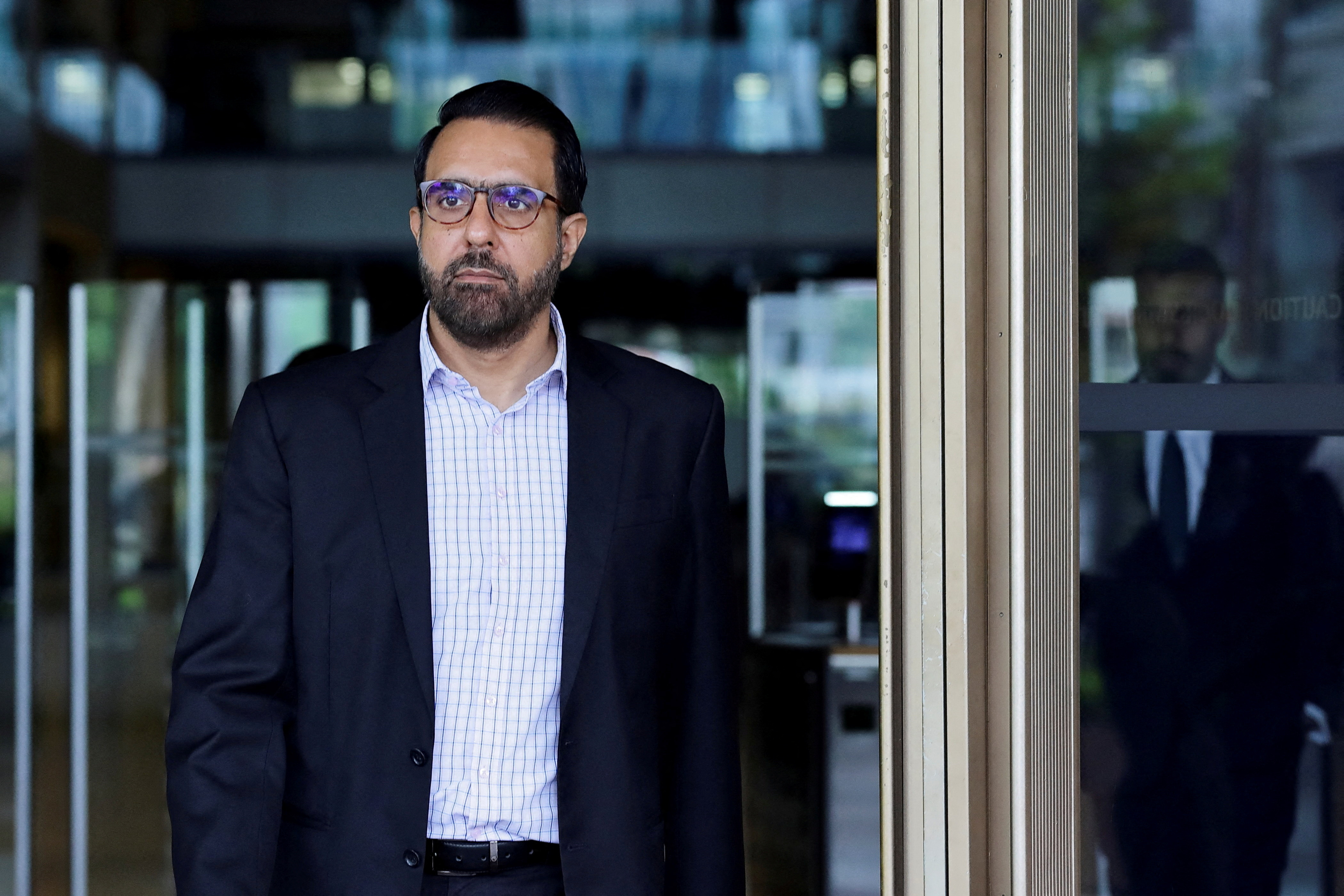FILE PHOTO: Leader of the Opposition Pritam Singh leaves the Supreme Court after his appeal was dismissed in Singapore