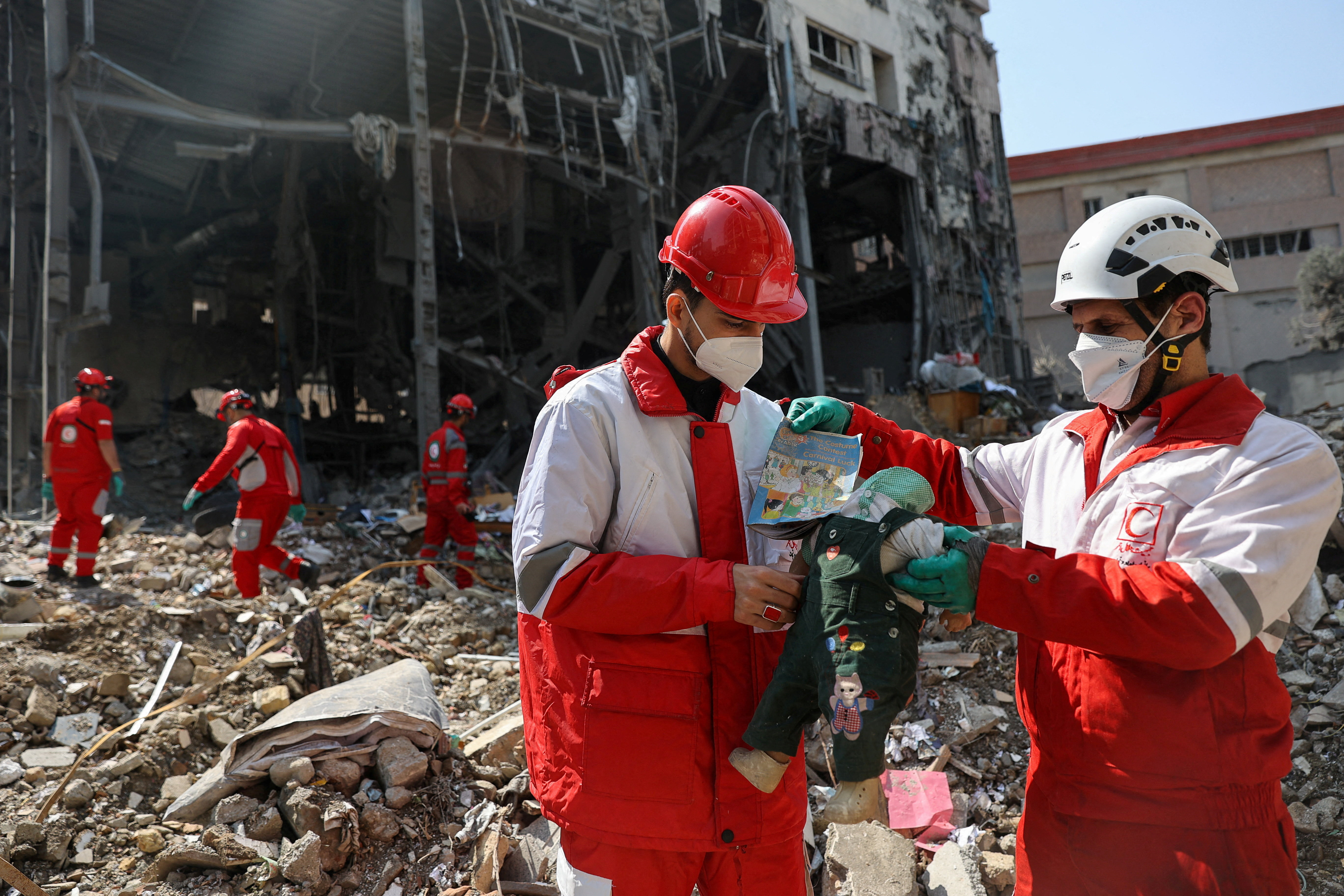Red Crescent rescue team at the site of a building that was damaged by a strike, in Tehran
