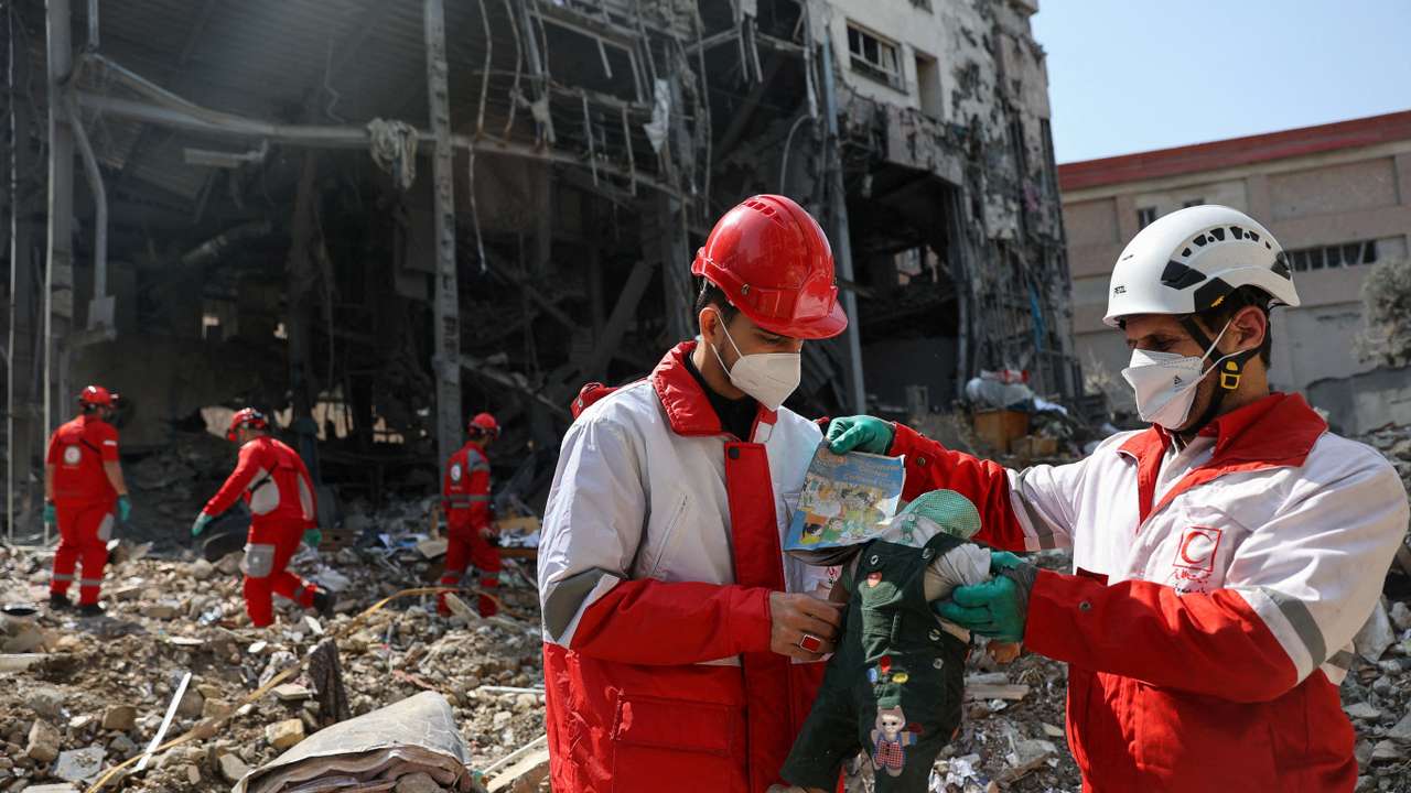 Red Crescent rescue team at the site of a building that was damaged by a strike, in Tehran