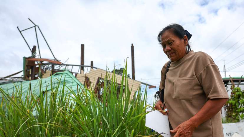'Thank God, we fled': Thai grandmother returns to ruins after border conflict
