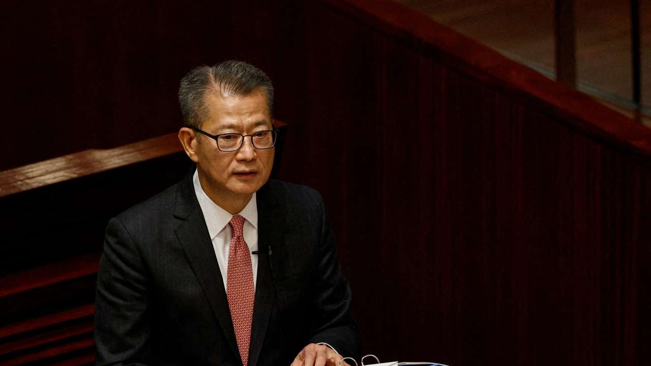 FILE PHOTO: Hong Kong's Finance Secretary Paul Chan delivers the annual budget address at the Legislative Council in Hong Kong