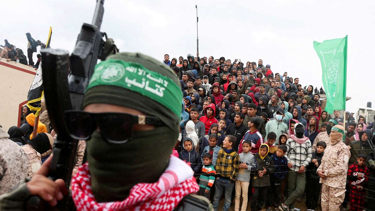 FILE PHOTO: Hamas hands over bodies of deceased hostages, in Khan Younis