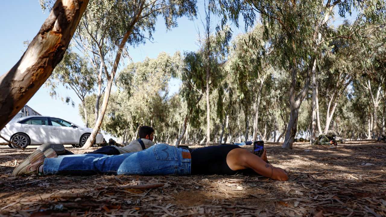 Bartender and survivor of the Nova Festival, May Hayat, visits the scene of the attack for the first time
