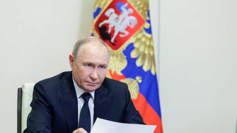 Russian President Putin chairs a meeting with members of the government via video link at a residence outside Moscow