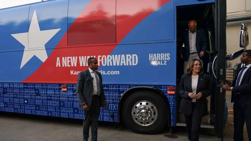 Harris and Walz step off a campaign bus after multiple stops, in Savannah