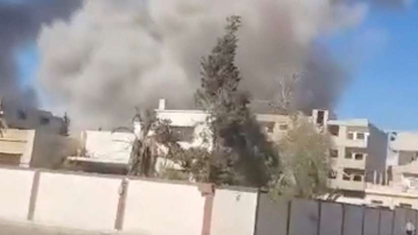 Smoke billows following an explosion after an attack on the historic city of Palmyra