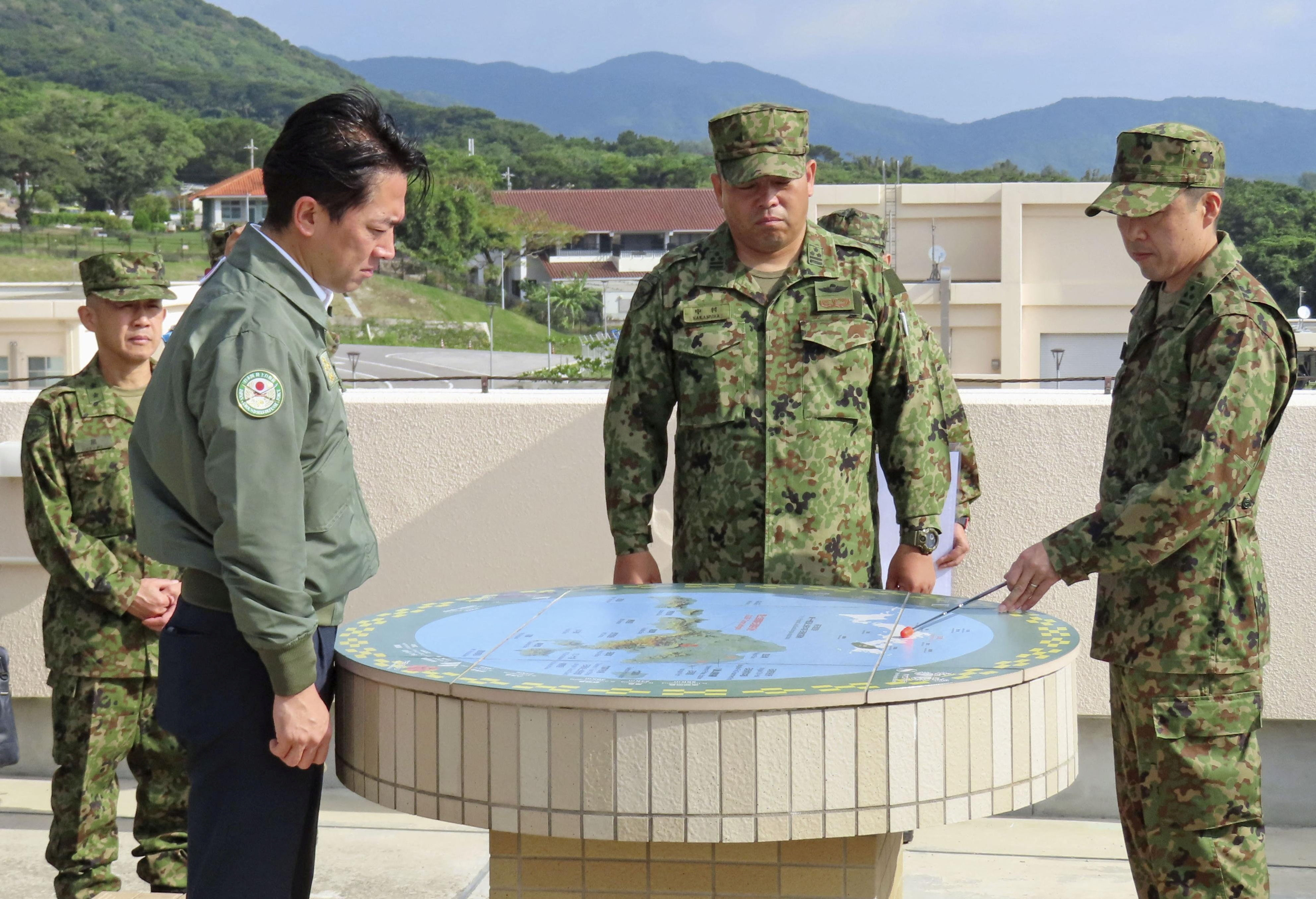 Japan's Defence Minister Shinjiro Koizumi meets Japan Ground Self-Defense Force soldiers at Camp Ishigaki on Ishigaki island