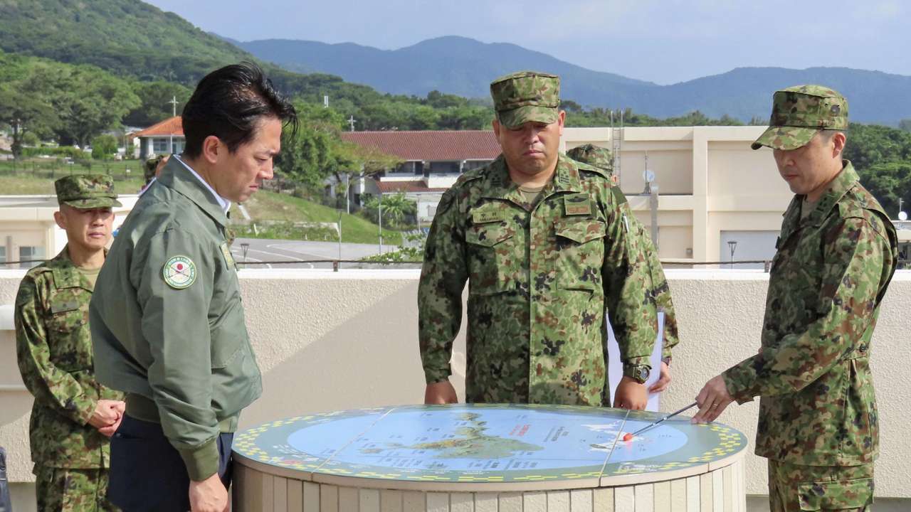 Japan's Defence Minister Shinjiro Koizumi meets Japan Ground Self-Defense Force soldiers at Camp Ishigaki on Ishigaki island