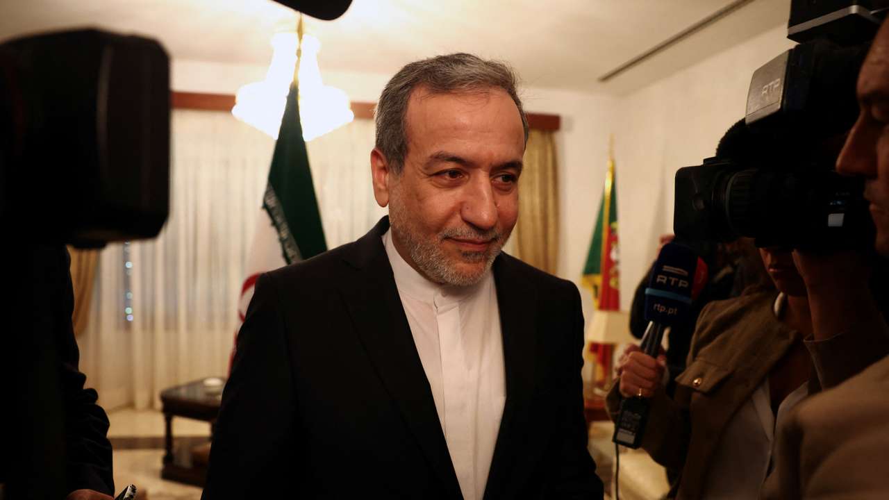 Iranian Foreign Minister Abbas Araghchi gives a briefing on the sidelines of a UN event in Lisbon