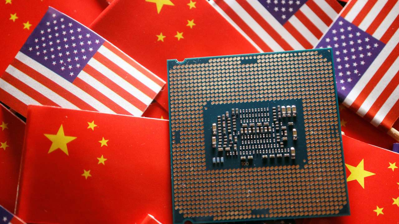 Illustration picture of Chinese and U.S. flags with semiconductor chip