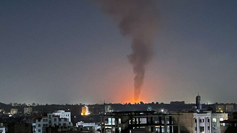 Smoke rises in the sky following U.S-led airstrikes in Sanaa