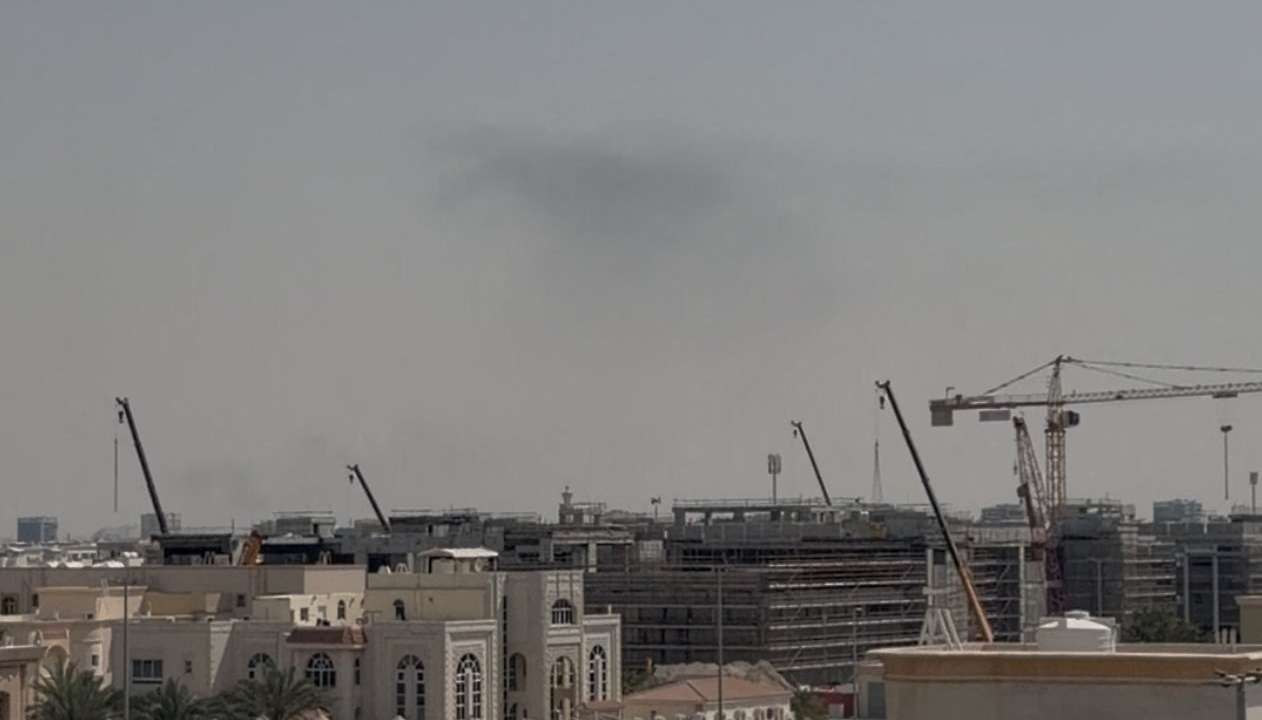 Smoke in the sky after reported blasts were heard, following strikes by the United States and Israel against Iran, in Abu Dhabi