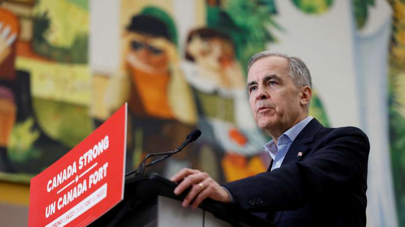 Canada's Prime Minister Mark Carney speaks in front of a mural in Gander, Newfoundland