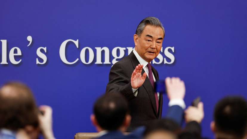 Chinese Foreign Minister Wang Yi attends a press conference on the sidelines of the NPC, in Beijing