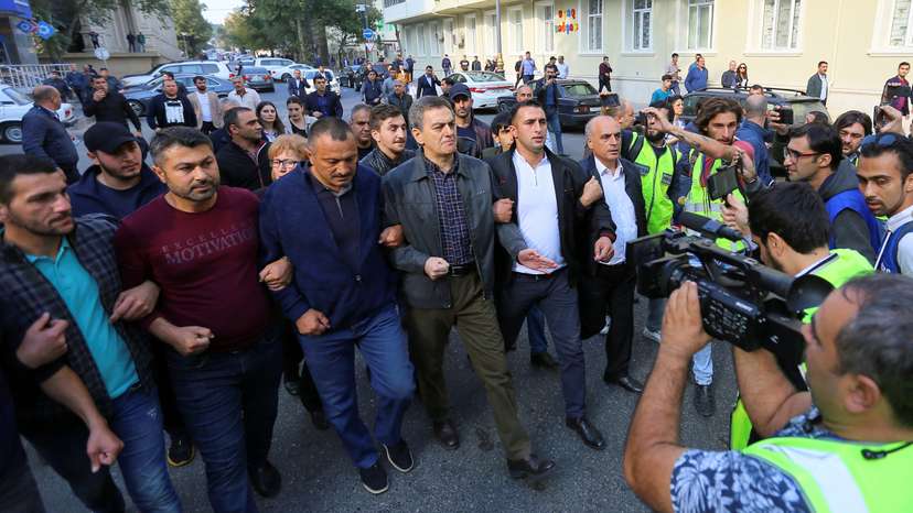 FILE PHOTO: Opposition supporters hold a rally in Baku