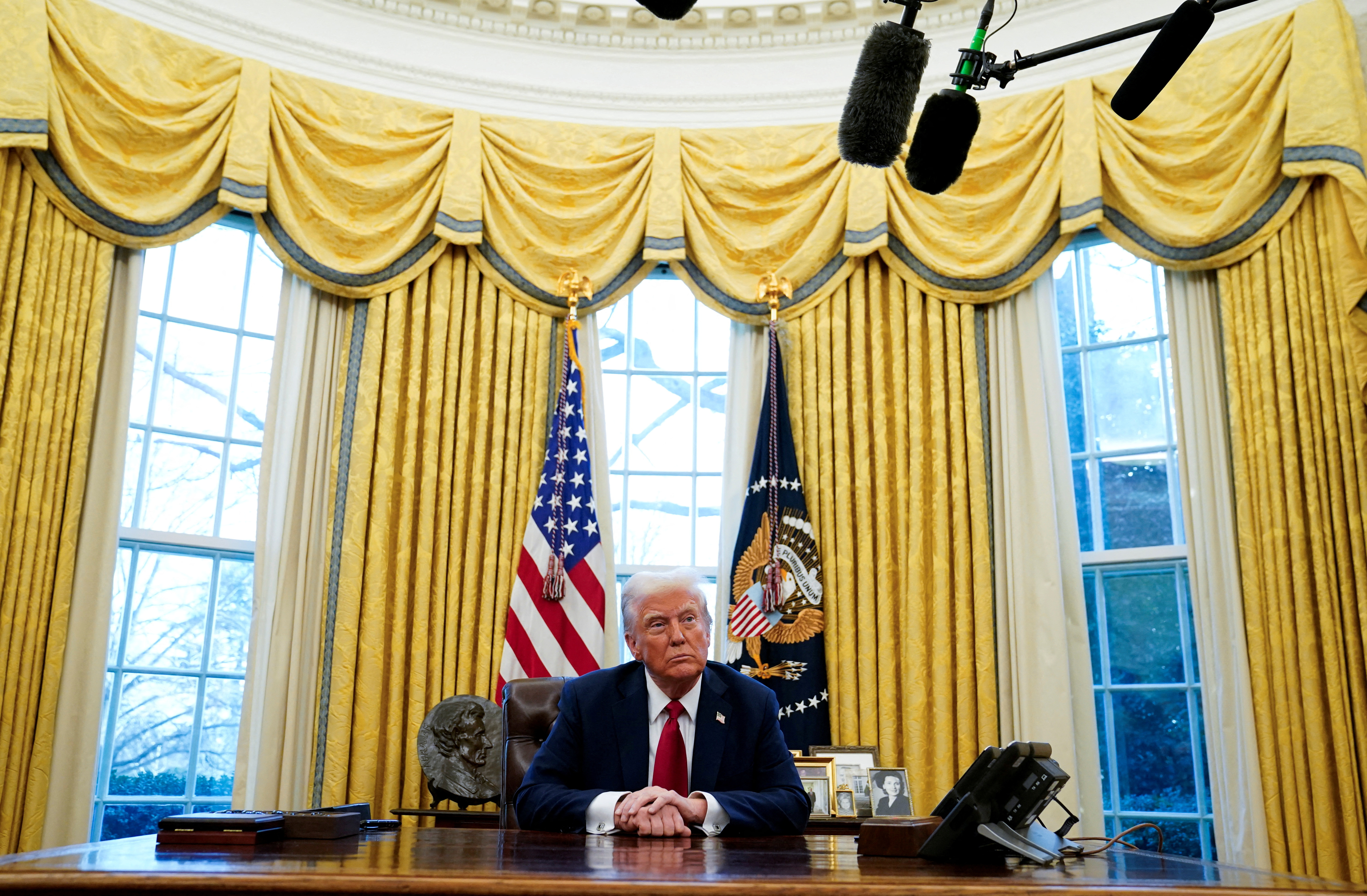 FILE PHOTO: U.S. President Trump signs executive orders at the White House in Washington