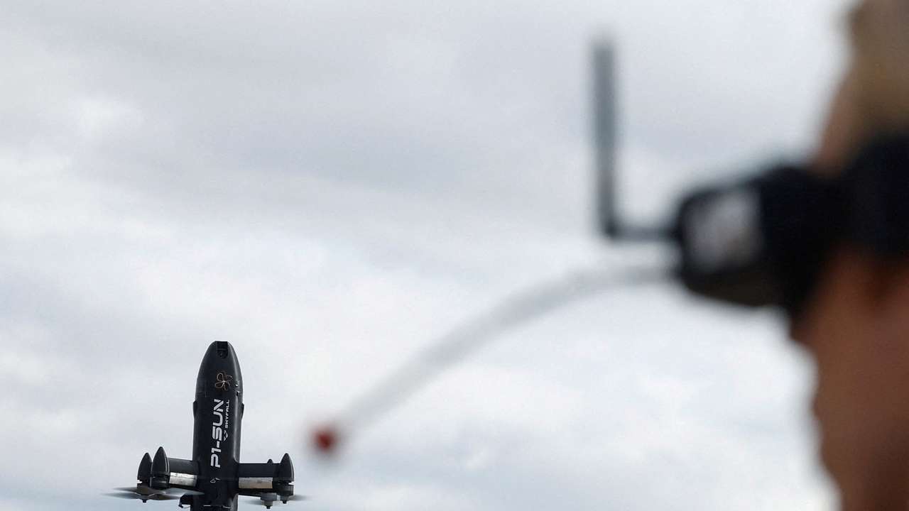 Employee of SkyFall company operates a P1-Sun FPV interceptor drone during a test fly at a training ground in an undisclosed location in Ukraine