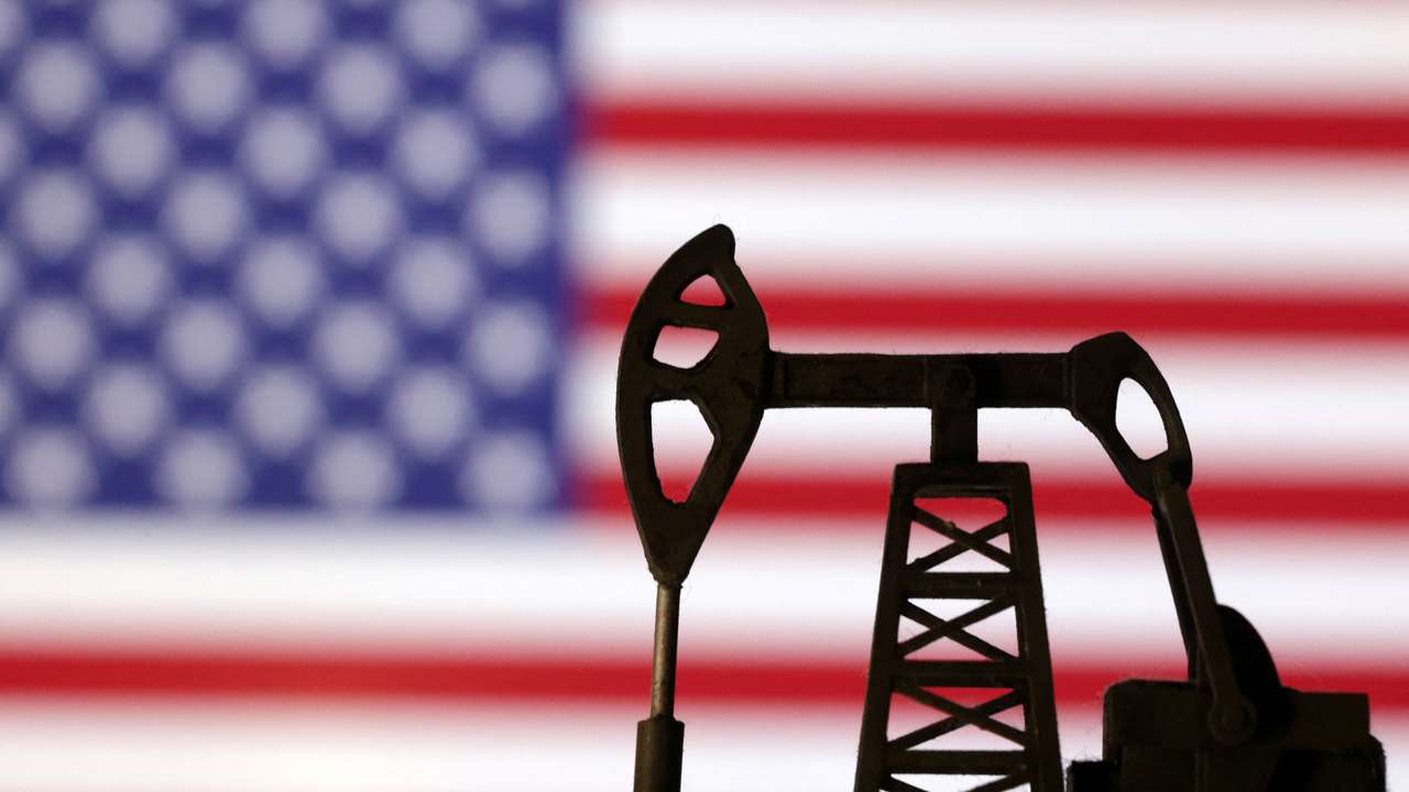 Illustration shows Oil pump jack and U.S. flag