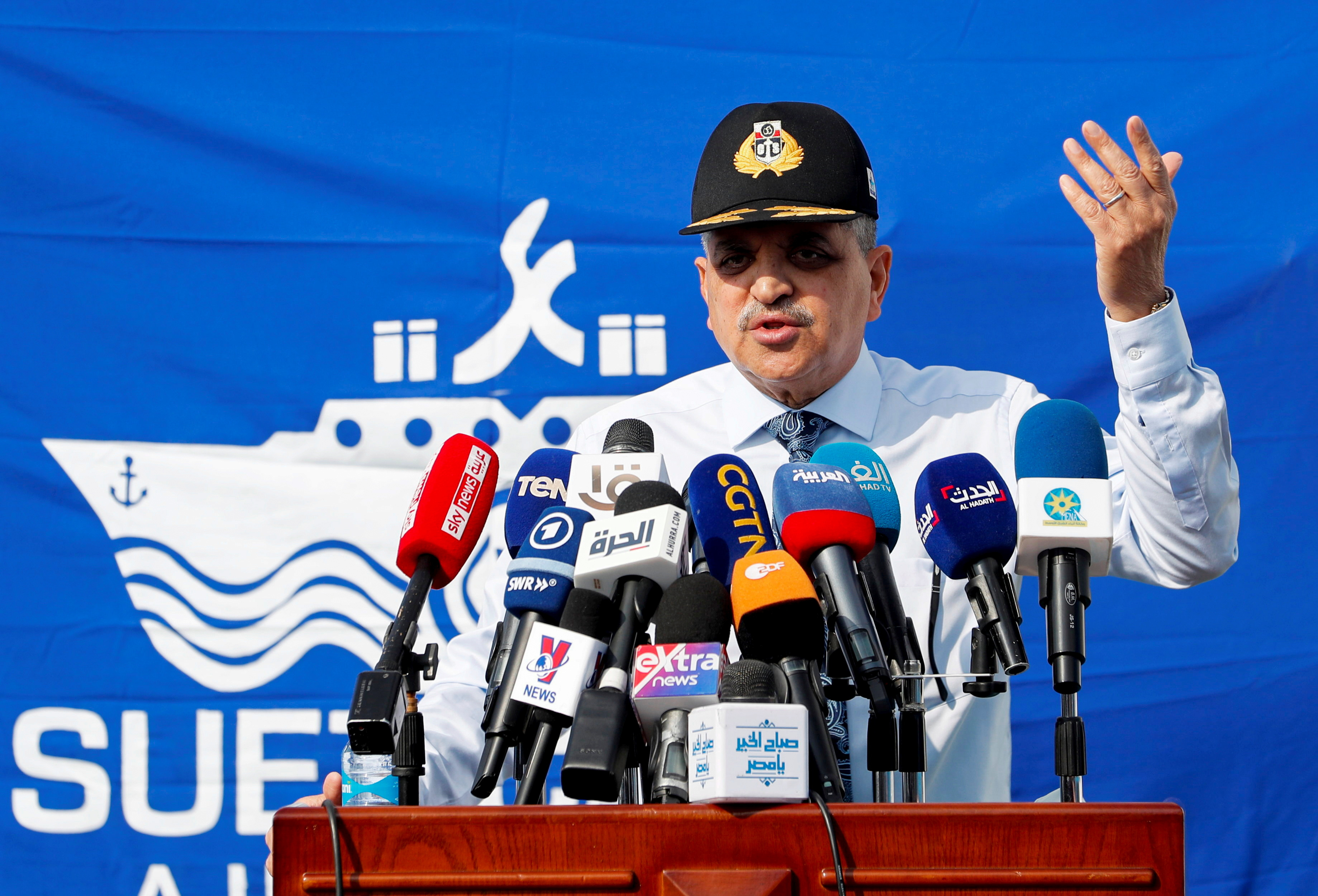 Osama Rabie, Chairman of the Suez Canal Authority, speaks during a news conference, in Suez