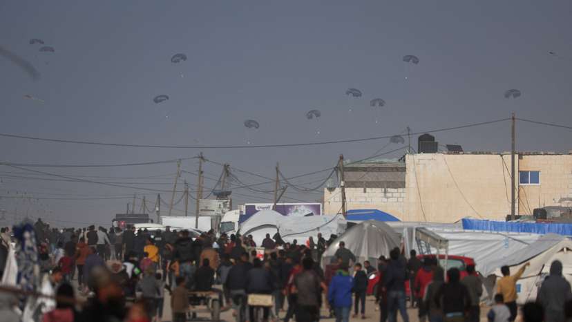 Aid is air-dropped over Gaza, amid the ongoing the conflict between Israel and Hamas, in Rafah