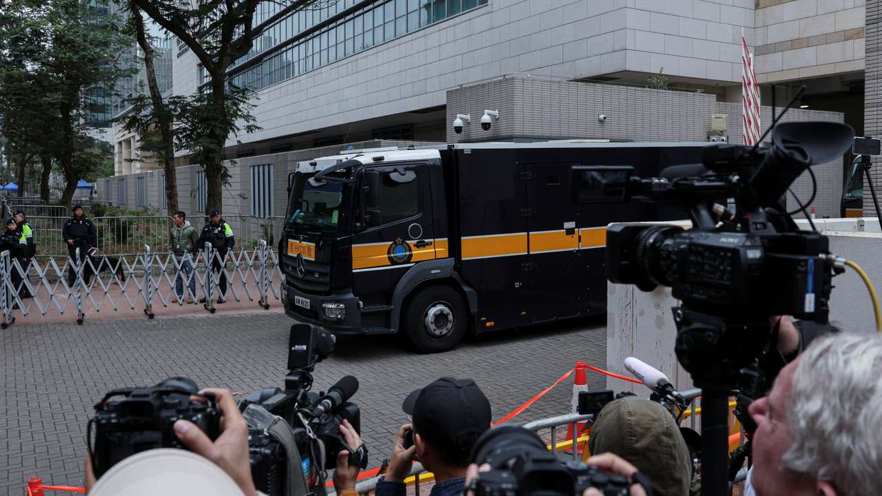A prison van believed to be carrying Jimmy Lai, founder of the now-defunct pro-democracy newspaper Apple Daily, leaves the West Kowloon Magistrates' Courts building following sentencing in his national security collusion trial, in Hong Kong