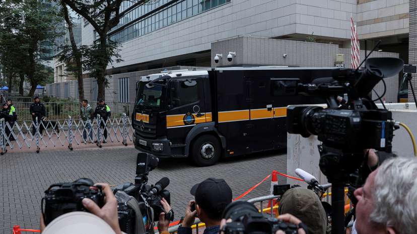 A prison van believed to be carrying Jimmy Lai, founder of the now-defunct pro-democracy newspaper Apple Daily, leaves the West Kowloon Magistrates' Courts building following sentencing in his national security collusion trial, in Hong Kong