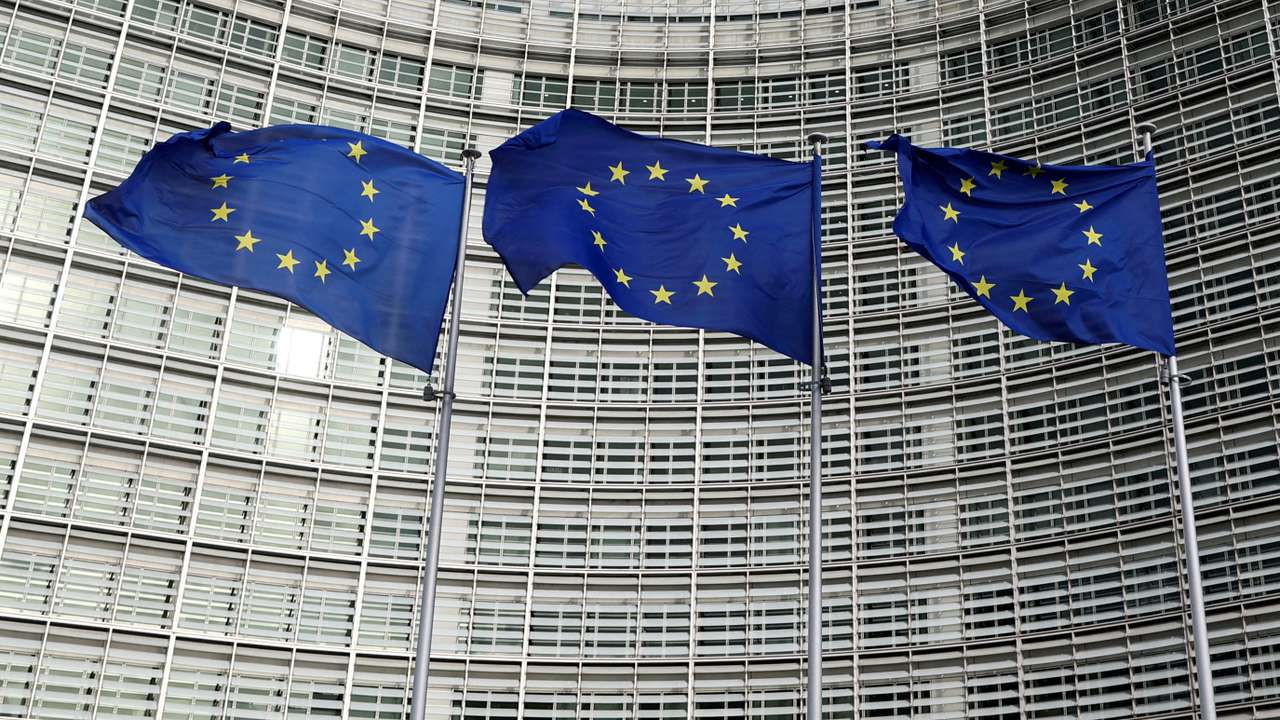 FILE PHOTO: European Union flags fly outside the European Commission in Brussels