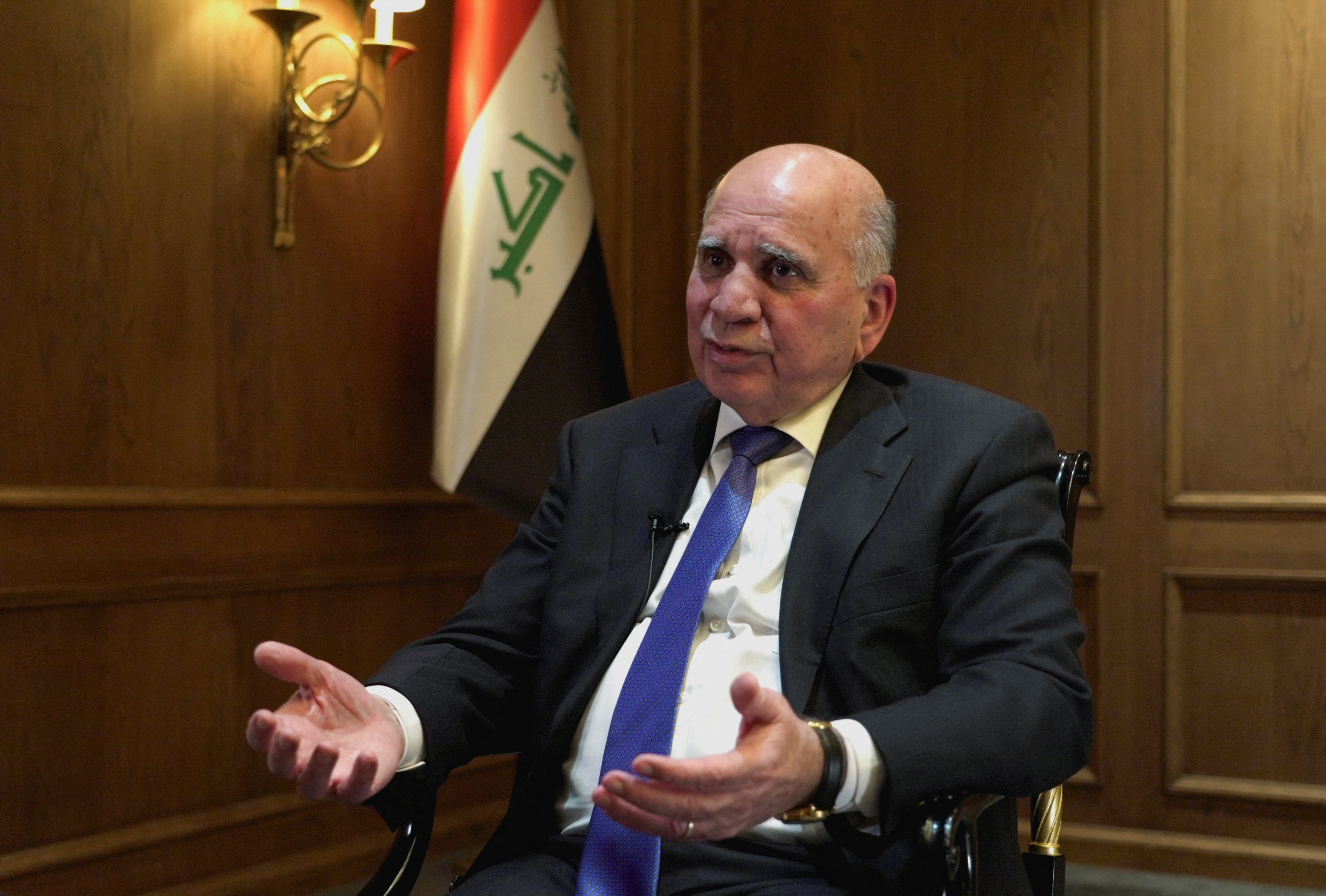 Iraqi Foreign Minister Fuad Hussein speaks during an interview in London