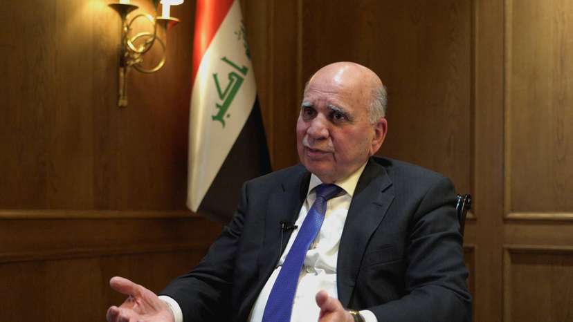 Iraqi Foreign Minister Fuad Hussein speaks during an interview in London