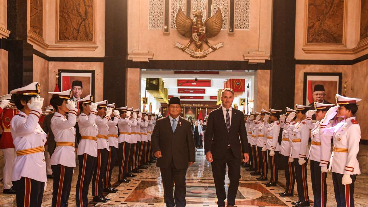 Indonesian Defence Minister Prabowo Subianto walks with Australian Defence Minister Richard Marles after their meeting in Jakarta